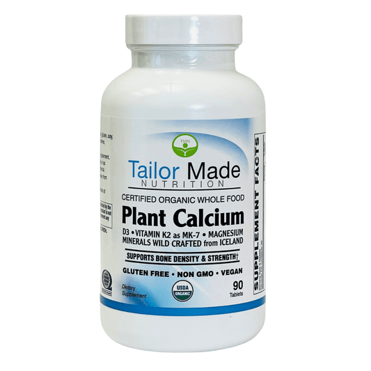 Bottle of Tailor Made Nutrition Plant Calcium supplement on a white background